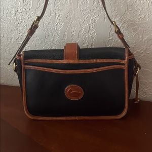 Vintage Dooney And Bourke Ivory Pebbled
Leather/ black Crossbody Bag